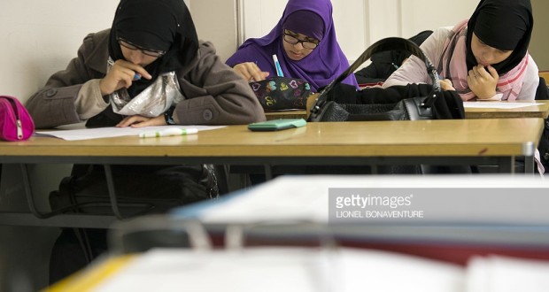 TO GO WITH AFP STORY BY CHARLOTTE PLANTIVE  
Muslim faithful students are pictured in their classroom at the La Reussite muslim school on September 19, 2013 in Aubervilliers, outside Paris.  AFP PHOTO / LIONEL BONAVENTURE